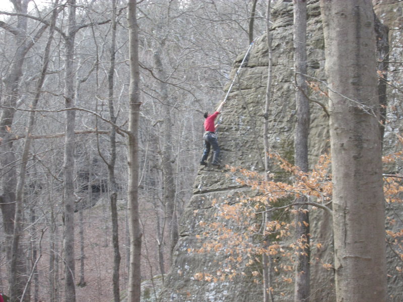 Unknown climber employing innovative ground up top rope tactics to reach the anchors on Master Marley. I had to capture the moment.