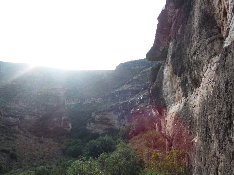 Looking downcanyon from the base of Violince Wall. The cave with the orange rock in the middle of the frame is (I think) Hueco Cave and Mad Cow Wall is between it and Violince Wall.