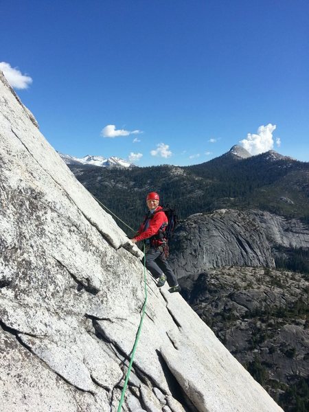 As you start the 2nd Pitch from the 60 meter rope belay, there is a scenic traverse. From the climbers position you begin to ascend up and right to the next belay station. It'a a great place for a hero picture. This is located at 37.739662, -119.539587 March 19, 2015