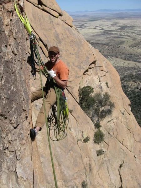Hanging belay on a chicken head in Cochise stronghold