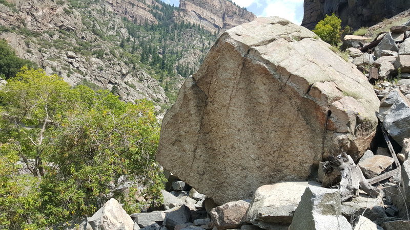 Anglerfish Boulder from downstream. The roof is on the opposite side.