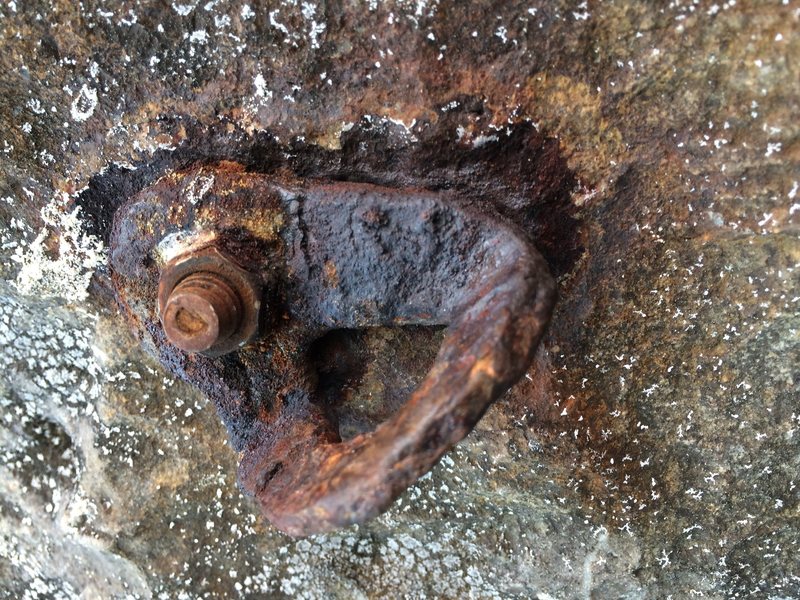 Traditional bolt and hanger on Phranang Beach. Thus the need for titanium glue in bolts