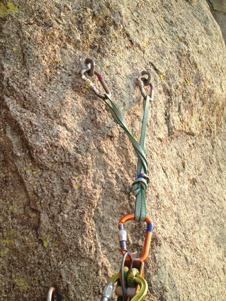 This is what you can expect for most of the belay ledges on Durance. Two or three bolts at about chest height, very solid.