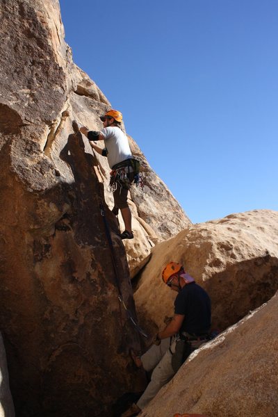 Belay station for Gandy (5.9) is kind of over this small chasm so we had our belayer anchor into the first bolt.