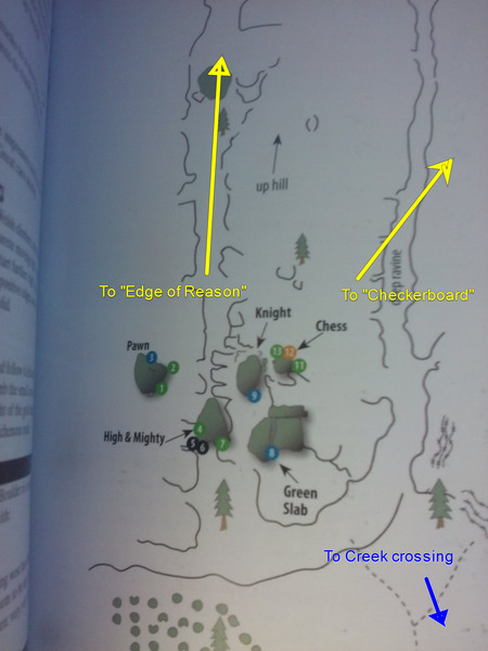 A picture showing a cluster of boulders with climbs in the Checkerboard Area. (From Wills and Mick's Guidebook)