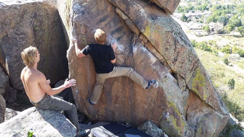 Right foot is on one of the start holds.