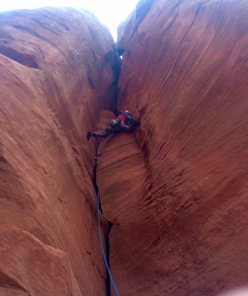 Derek at the crux, right before entering the chimney