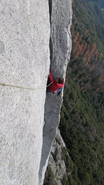 Climbing up the clean corner on the 7th pitch.