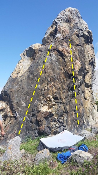 Detailed harder climb on the black section of rock to the left maybe a V2-V3 easier climbs on the right maybe V1-V2