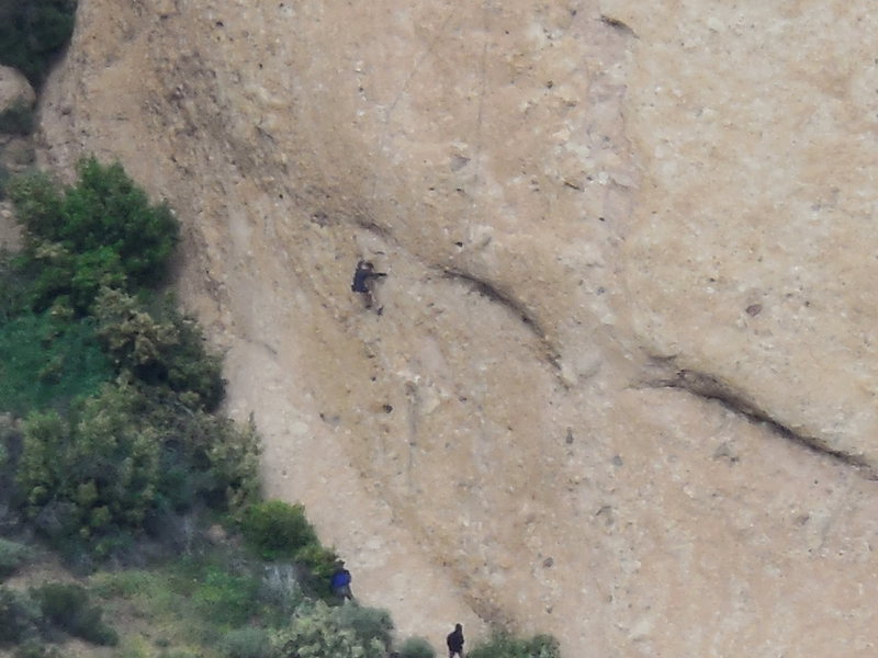 A climber on "Amarillo By Morning" from the highest ridge to the south.