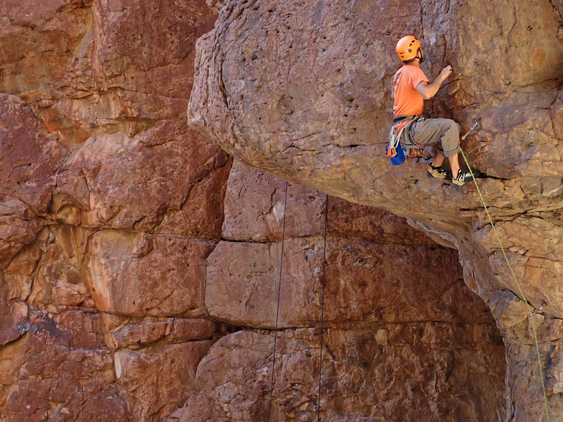 Climb shallow sharp pockets to next bolt.