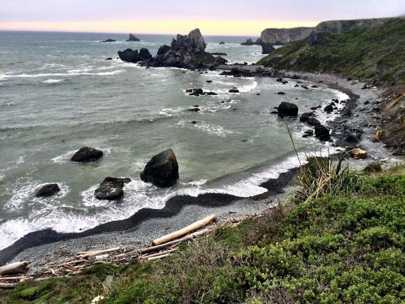 The secret beach adorned with sea glass and jade that leads to Twin Cove Crag