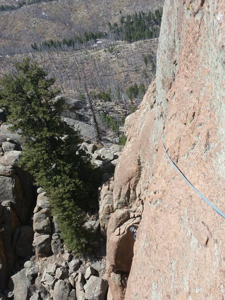 The airy unprotected traverse on P2. I am at the start of P3 for Gobbler's Grunt. I think you can go up a little higher on the traverse and sew it up with insecure smaller gear, but the difficulty never exceeds 5.7.