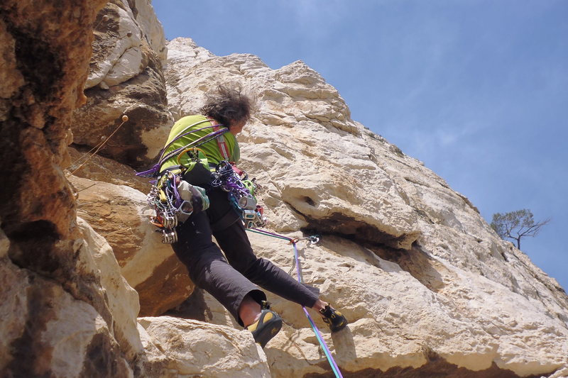 On the Crux pitch in Le Riz au Lait, a nice trad route- 5.10a- in Les Calanques,