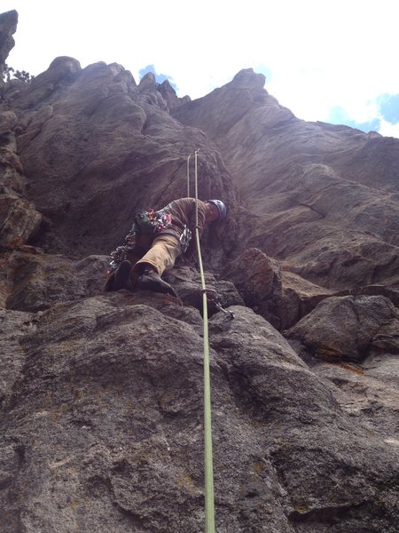 Near the bottom. Second bolt clipped above.