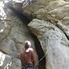 Johnny Arms belaying Matthew Devine on the Sloth 11b at Sand Rock.