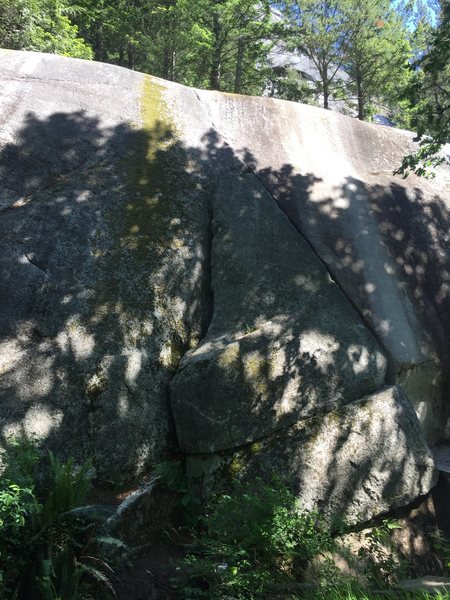 Climb begins on the left of the large triangular flake