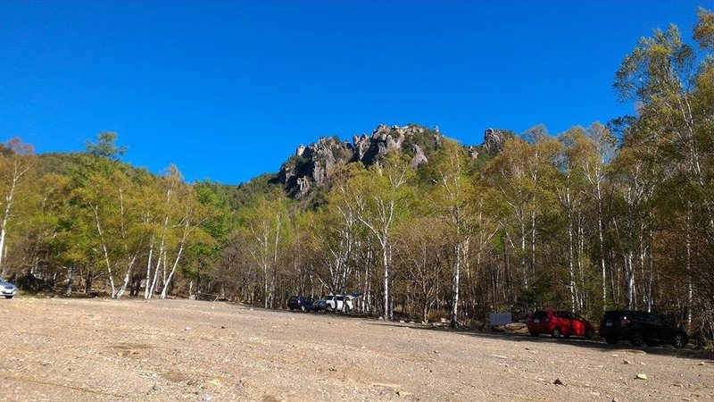Other side of parking lot with The Roof Rocks in the background.