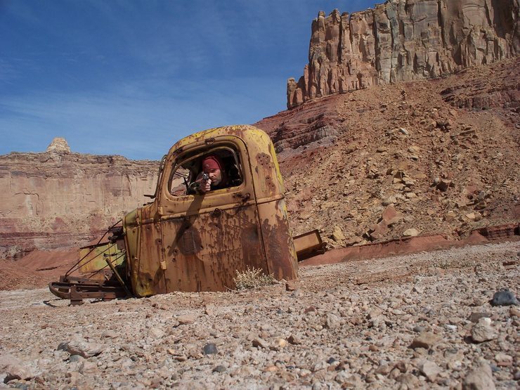 Tomsich Butte truck cab, and some thuggy desert rat. Top Hat and North Buttes behind.