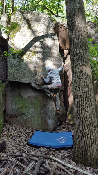 Using the arete to pull up to the slab. Fun and certainly easier than doing Murder Slab proper.
