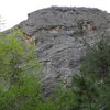 The crag above the approach trail approximately one mile from the trailhead that has several unknown bolt lines.