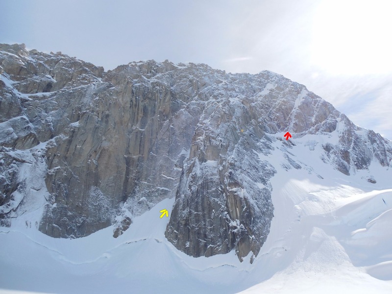 View of the peak from camp. Yellow arrow points to the start of the Colton-Leach, which climbs the large gully behind the buttress. Red arrow is at the base of the West Face Couloir.