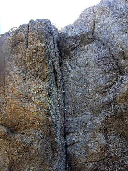 We cut left just above the bulge and went to the bolted anchor. A bit of rope drag but not horrible.