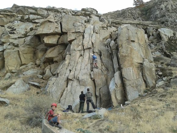 Random person climbing right crack