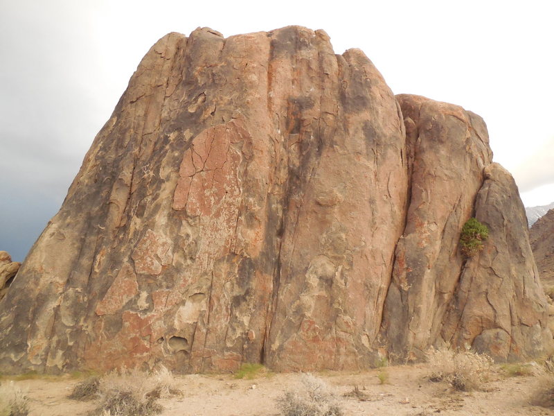 The Groove climbs the steep black line just right of the center of the face.