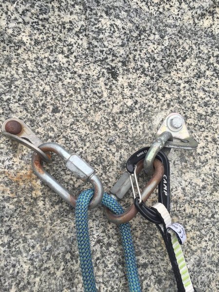 The sketch bolt on the left that was very loose and somewhat rusted with the good bolt on the right