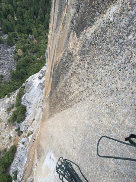 Looking down pitch 5 at the reachy bolt ladder. That's one blank steep face!
