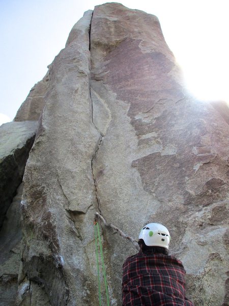 We found a handy stick at the base of Crack of Doom for a stick-clip of the pin. Most climbers end up doing this, to prevent an ankle twisting/breaking fall on the 11c crux start. Apparently the pin was replaced in 2011 after the previous one fell out.