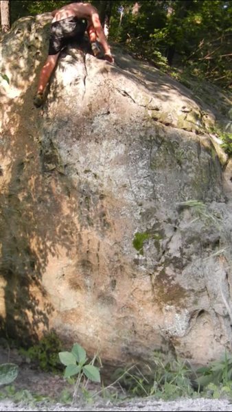 Once left hand is secure (ha), mantel with right hand, match right foot
