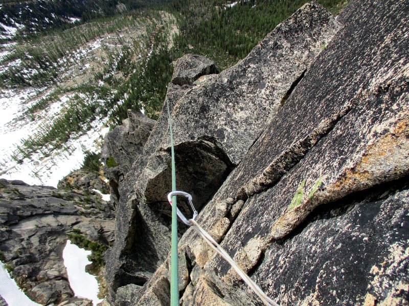 Looking down while leading Pitch 6 of Paisano. It's easy to generate a lot of rope drag on this pitch so I ran it out on easy terrain.