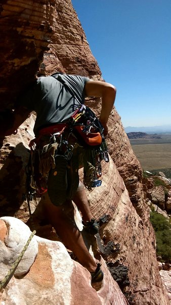 p3 traverse right off the belay 10ft then diagonally up and right till you meet the corner. continue up to the large ledge under the final pitch