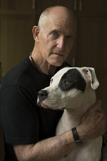 Portrait by Liza Weems of Bob Carmichael and his faithful companion Happy