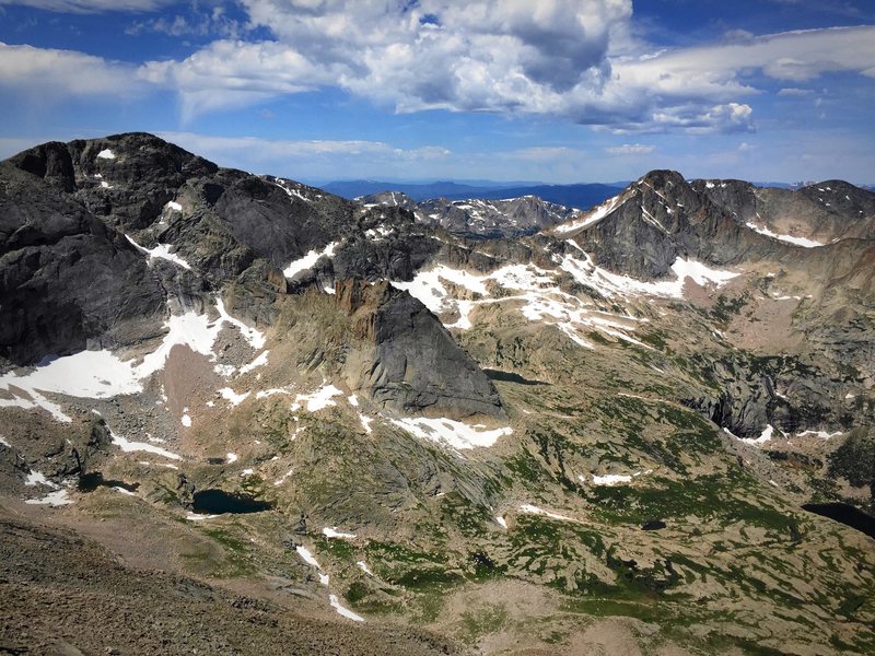 Looking west into Glacier Gorge. Taken from the west face of Long's Peak. Chiefshead, Spearhead, and McHenry's Peak (left to right).