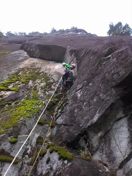 Brian Ebert getting the rope up a on cold rainy day.
