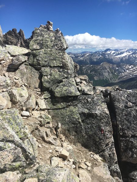 If there are too many parties on Northeast ridge and you need to bail you can repel down the Crescent bugaboo col. Here is a picture of the top anchor. There are four repels down to the glacier that can be done with the 60 m