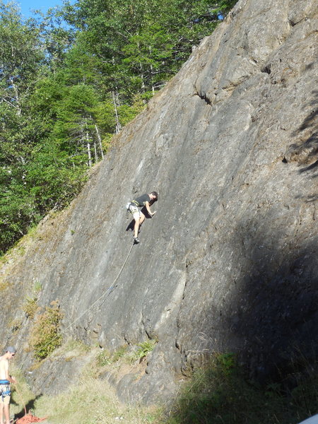 Connor demonstrating excellent footwork and a cool head while leading on Owl Slab.