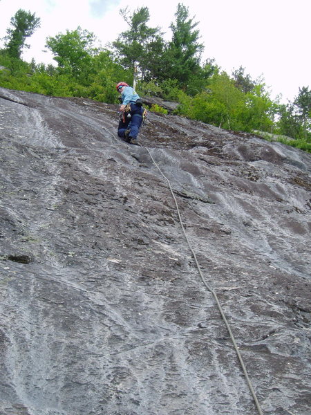 P2 - "Follow the easiest line"...35-40 ft to the first bolt on P2. RW has arrived. This is the bolt in the "small, smooth slab".
