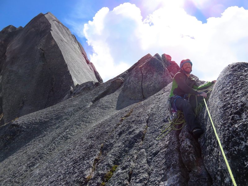 On top of the route. North summit behind. Most parties rappel the route. But you can continue to the North summit via the Buckingham route and rapping the Beckey-Greenwood rappel route.