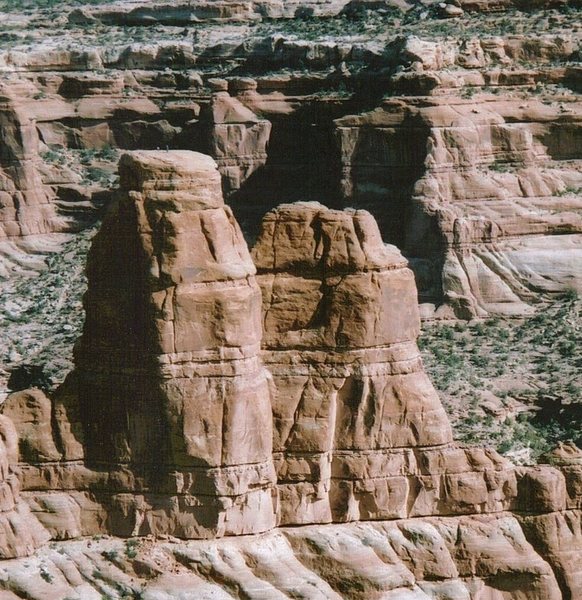 FA Dreamcatcher Tower Arch Canyon Utah with Andy Ross and  Cam Burns 2005 .. Note tiny figures on top 