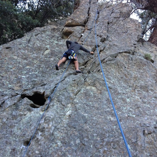 Joel Alexander Bernett practicing placing pro as if leading while on top rope. All with one 60 meter rope. Trad School in session.