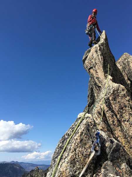 On the final fin traverse to the top of Aasgard Sentinel. Final pitch is shared by Acid Baby and The Valkyrie. Photo by Janet Arendall.