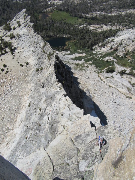 The classic pic. NB approaching the crux on the upper arete.