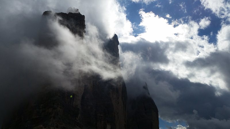 With a slightly better forecast, we managed to climb the famous Spigolo Giallo "Yellow Edge" at Tre Cime. A very nice 13 pitch route. This is a view of the whole group in the clouds from the pass - on my hike down from our climb.