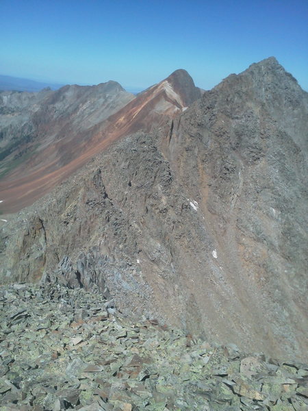 East Ridge of S6, fourth class. East Ridge of Mears Peak (the red 'un) behind.