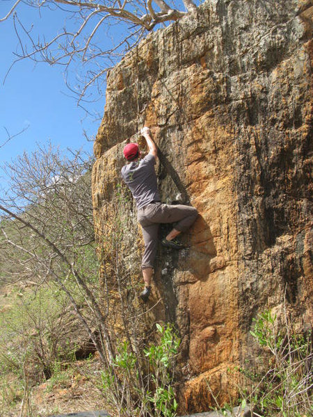 Jesse moving past the crux. View from straight on the face.