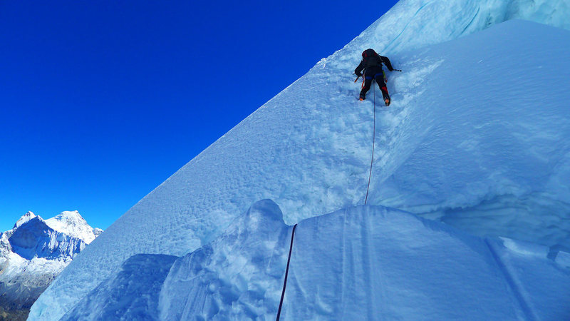 Downclimbing a short step about an hour above high camp.